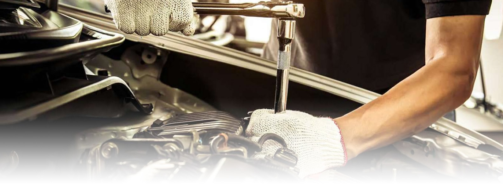 Image Of Mechanic Fixing The Engine